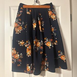 Le Lis Navy Skirt with Orange Floral Design